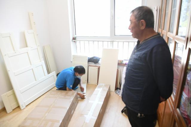 老居民的新篇章 望壇回遷居民凌晨遷新居